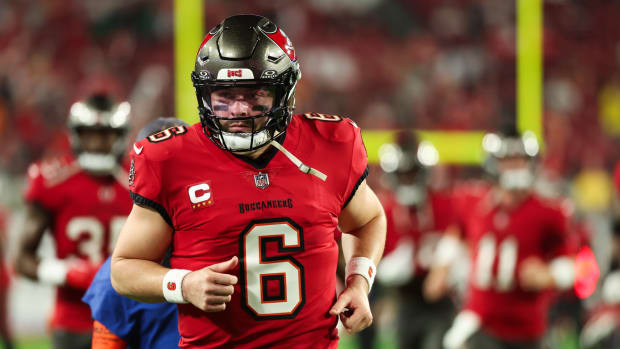Tampa Bay Buccaneers quarterback Baker Mayfield (6) runs during warm ups before a 2024 NFC wild card game against the Philadelphia Eagles at Raymond James Stadium.